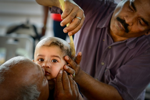 Grandpa supports Hair Cut