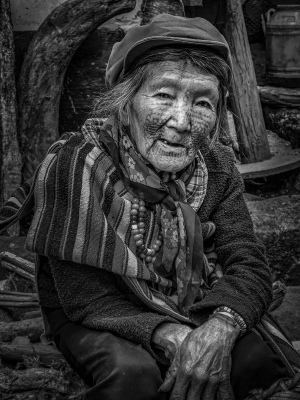 Face-tattooed woman