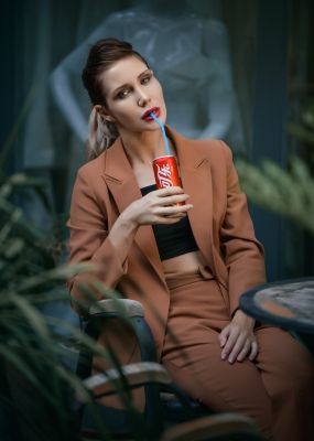 A woman who drinks coke
