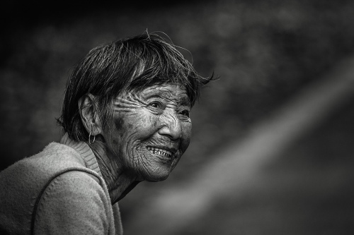 Old woman in ancient town
