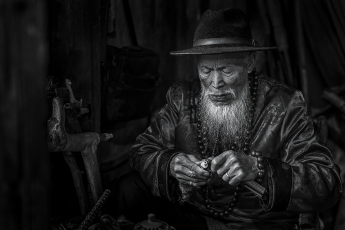 The elder making cigarette holders