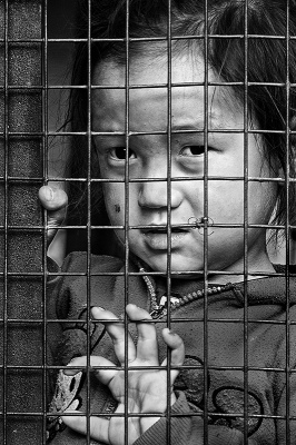Baby in cage 1