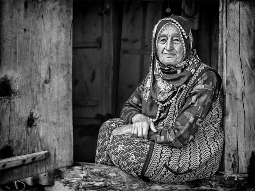 Lady In Pokut Doorway