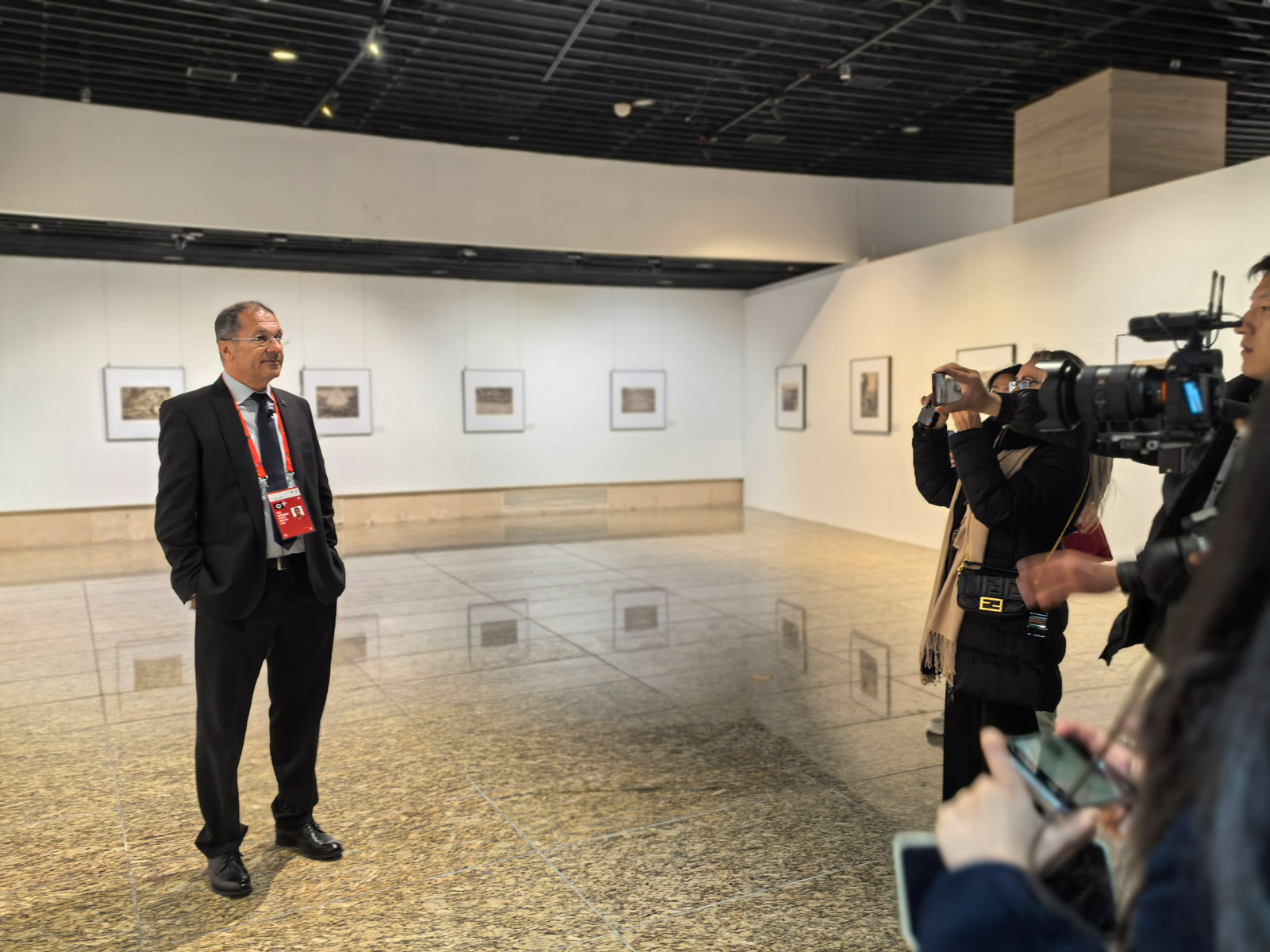 GPU President Manolis Metzakis interviewed by media at the exhibition.