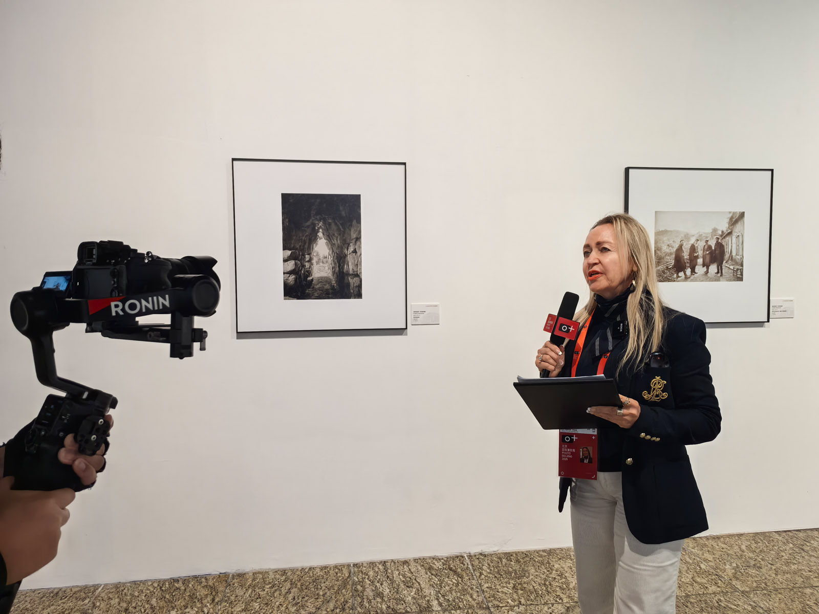 Greek artist Stella Koukoulaki interviewed by media.